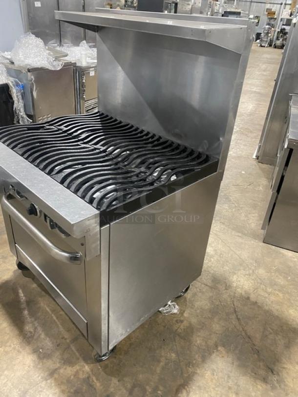 Southbend S36D commercial stainless steel natural gas 6-burner range/oven with non-clog wavy grates, backsplash, salamander shelf, wired oven rack, and casters. Serial No. 13H73798.