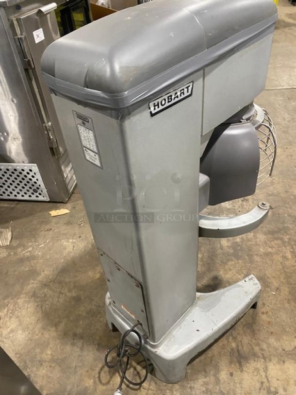 Hobart Legacy HL300 30 Qt. commercial mixer, stainless steel bowl guard, floor model, electric-powered, 100-120V, on legs.
