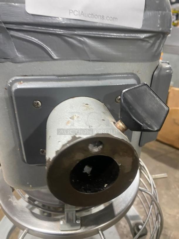 Hobart Legacy HL300 commercial mixer, 30 qt. capacity, stainless steel bowl guard, visible wear, model label partially visible.