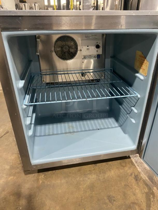 Delfield Enodis 406CADD1 undercounter refrigerator; stainless steel, single door, poly-coated rack, 27", on casters, SN: 0406036100311-T.