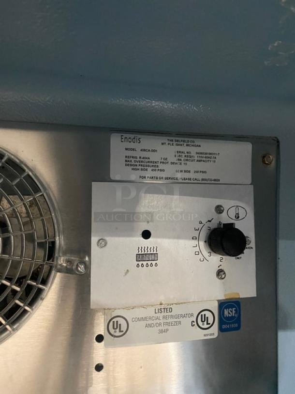 Delfield Enodis 406CA-DD1 stainless steel undercounter refrigerator, 115V, with control panel and NSF, UL labels. Serial: 0406036100311-T.