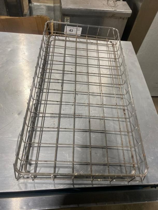 Chrome plated full-size wired rack for bagels/pastries, rectangular shape, grid pattern. Used condition. Item tag: 43.