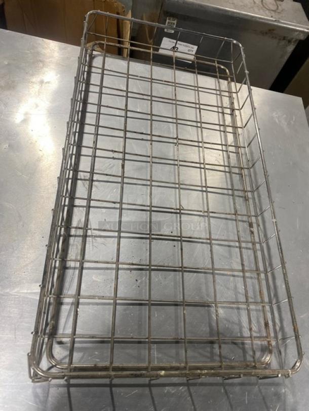 Commercial chrome plated full-size wired rack for bagels/pastries. Durable, spacious design. Used condition, minor wear visible.