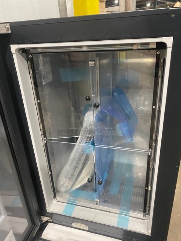 Vendo Lumilinna Series ICESC40BXIWU, black, undercounter super-cooling crystallizer. Features internal split doors. Scratch-N-Dent condition.