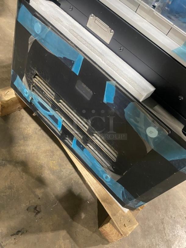 Vendo ICE-SC40BXIWU slush cooler, single black door, split internal doors, scratch-n-dent, model/serial tag visible.