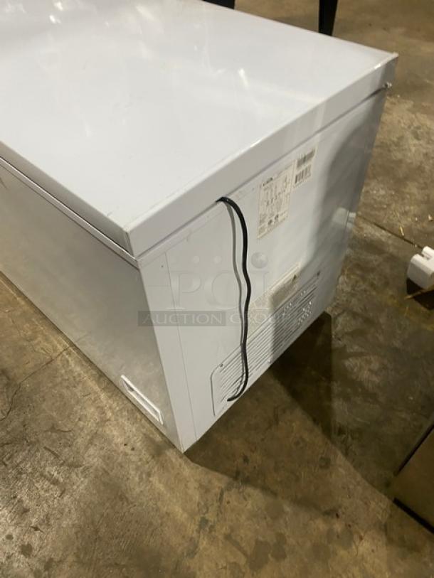 KoolMore 2022 commercial white 60" chest freezer, model SCF-16C, with poly-coated wired basket, lightly used, 115V.