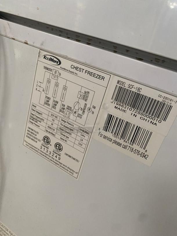 KoolMore SCF16C 60" chest freezer, white, 2022 model, includes poly-coated wired basket, working condition, tags visible.