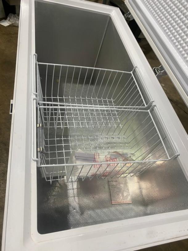 KoolMore 2022 model SCF16C 60" commercial chest freezer with poly-coated wire basket, white exterior, excellent condition.
