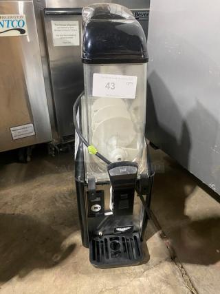 Vollrath Stoelting CBE117 commercial slushy machine with 3.2 gal. clear hopper, drip tray, black exterior, 115V, lightly used.