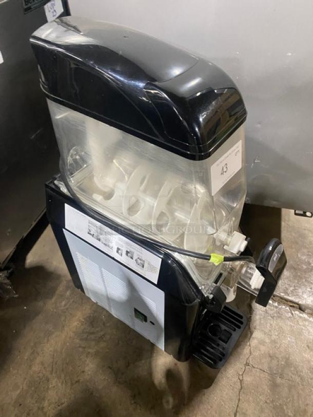 Vollrath Stoelting Series CBE117 single slushy machine with 3.2-gallon polycarbonate hopper, black, includes drip tray, 115V.