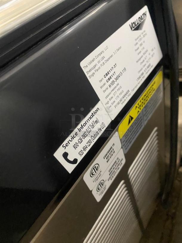 Vollrath CBE117 black commercial countertop slushy machine with 3.2-gal clear hopper and drip tray. Model: CBE117 SN: H109-349413-119.