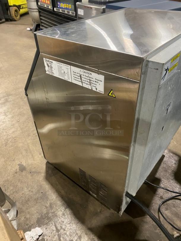 Coldline ICE180 stainless steel ice maker, electric, air-cooled, undercounter model, on legs, 115V, visible operating label.