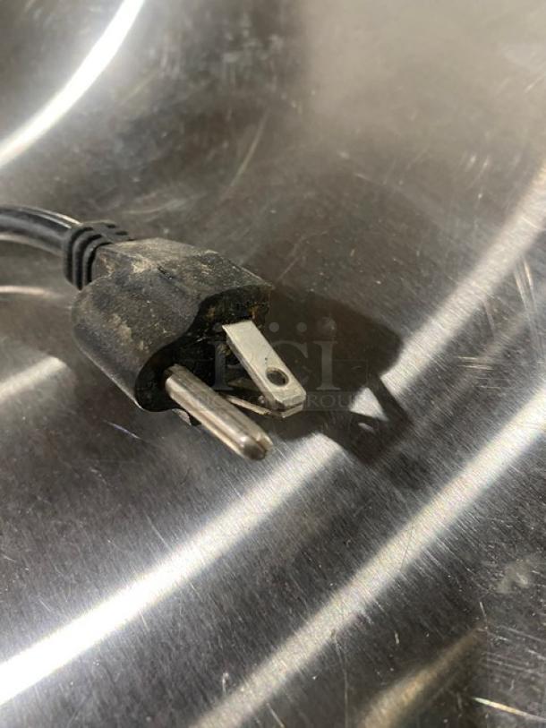 Avantco 194UC160FA ice machine power plug on stainless steel surface; electric, 115V, air-cooled, not visible in full.