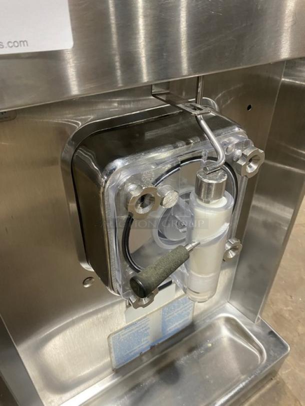 Taylor 340D-27 stainless steel slush machine, single hopper. Electric 208-230V 1 Phase, SN: K9076921, in used condition.
