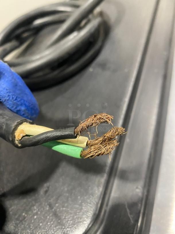 Damaged power cable for Taylor Model 340D-27 beverage machine, showing exposed wires and insulation issues.