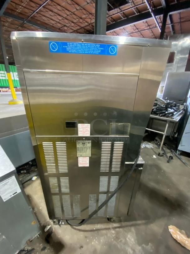 Taylor 8756P-27 stainless steel twin/twist soft serve machine, 3 dispensers, Horizon pump, on casters, model SN: M1064476.