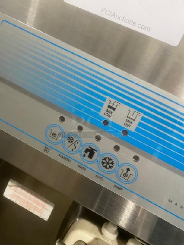 Taylor 8756P27 stainless steel soft serve machine, 3 dispensers, drip tray, Horizon pump, 208-230V, 1 phase, on casters.