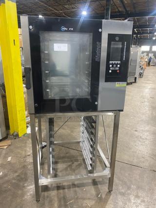 Univex Corp Bistrot 665 commercial stainless steel convection/steam combi oven with digital touch control and pan holding stand.