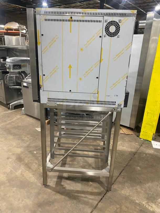 Univex Corp BISTROT 665 stainless steel convection/steam combi oven with digital touch control and pan holding stand, on legs.