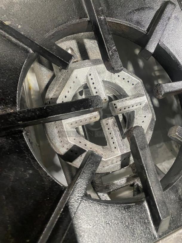 Jade Range commercial stainless steel 4-burner split-top char broiler range/oven combo, gas powered, with back splash.