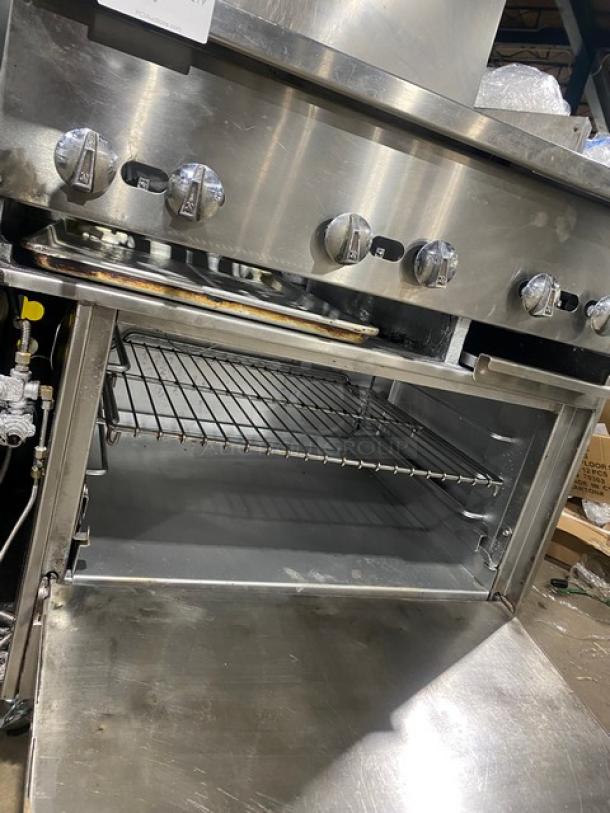 Jade Range stainless steel gas 4-burner char broiler range/oven combo with backsplash. Includes wired oven rack and casters.