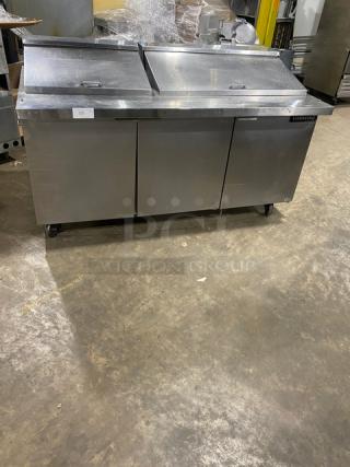 Continental SW72-30M stainless steel 3-door refrigerated prep table on casters; bain marie style; used condition.