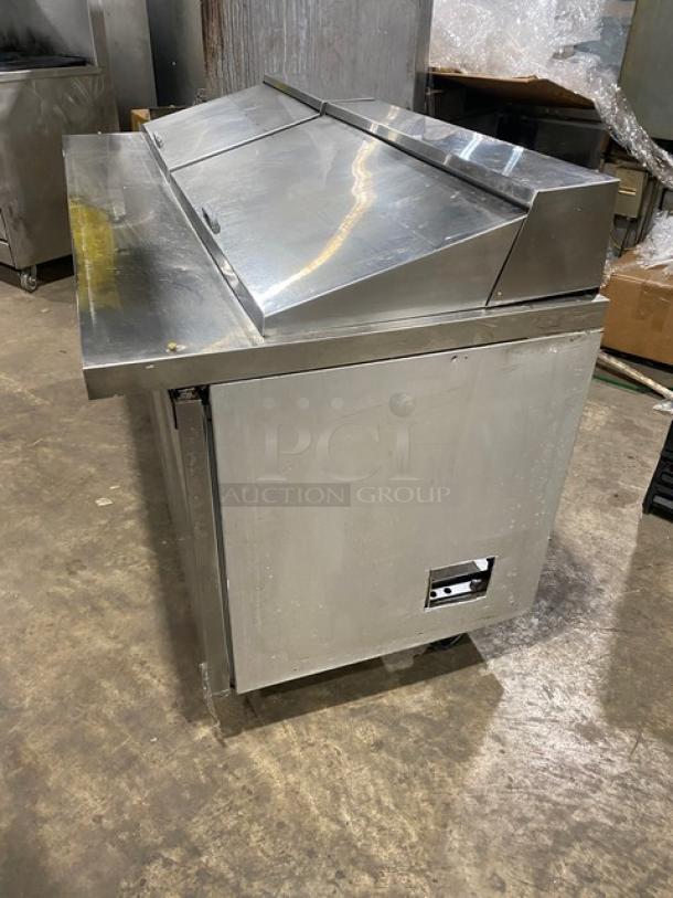 Continental 3-door stainless steel refrigerated prep table, Model SW72-30M, with Bain Marie Mighty-Top, on casters.