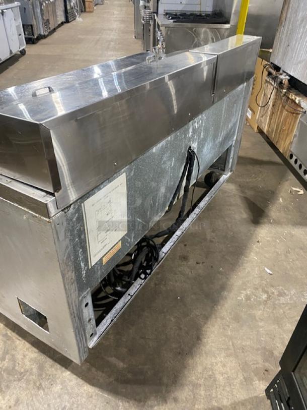 Continental SW72-30M 3-Door Refrigerated Bain Marie Salad/Sandwich Prep Table, stainless steel, on casters, 115V.