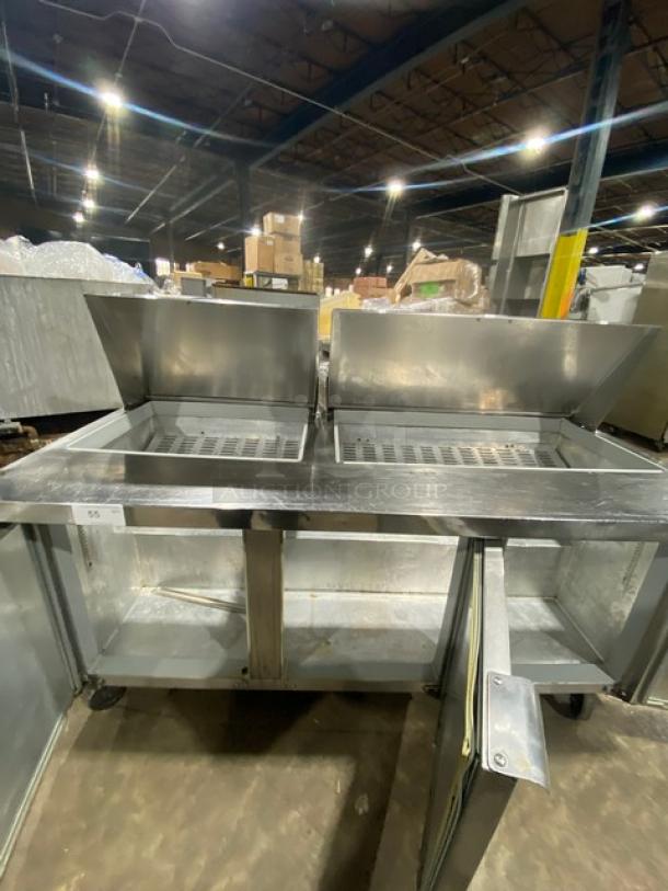 Continental 3-door stainless steel refrigerated prep table, model SW72-30M, on casters. Features Bain Marie tops, SN 143B8865.