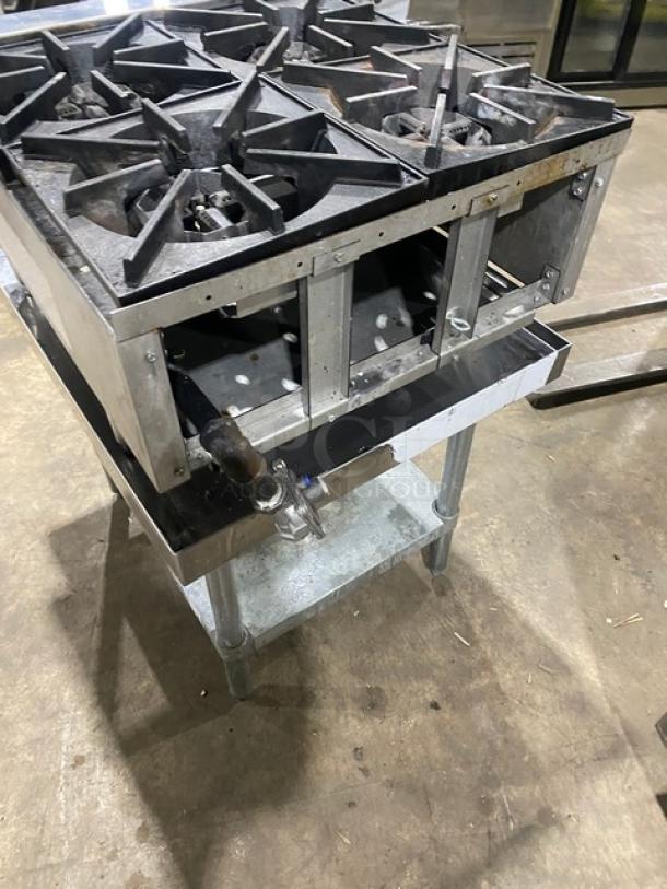 Cookline stainless steel 4-burner countertop hot plate range, model CHP244, on undershelf stand, natural gas powered.