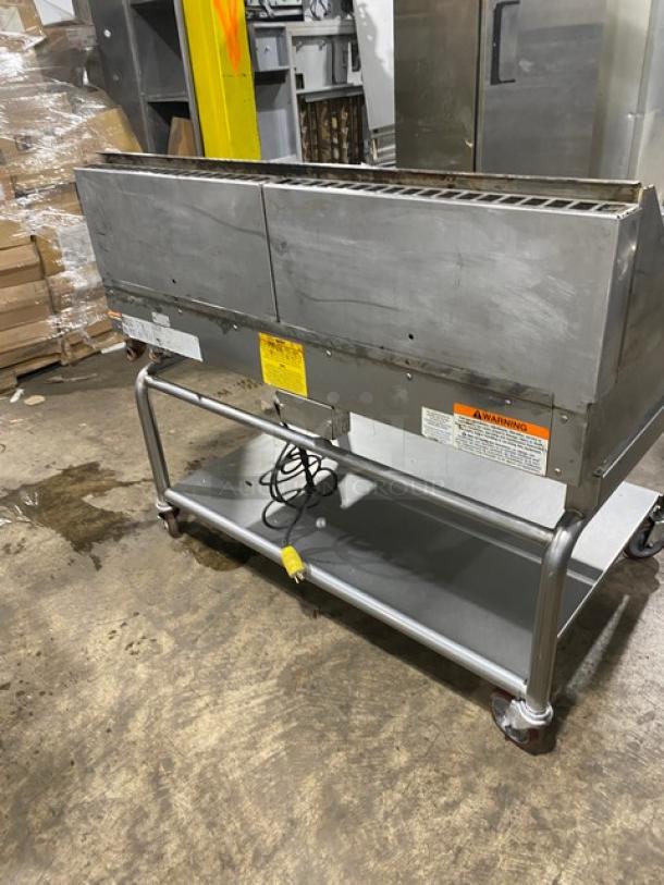 WoodStone stainless steel gas countertop 48" plancha griddle with back/side splash and undershelf cart, model WSPL48364CT00NG.