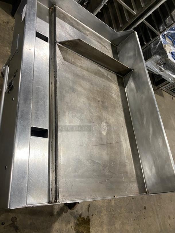 WoodStone 48" stainless steel gas griddle, model WS-PL-4836-4-CT00NG, with back and side splash, undershelf stand, and casters.