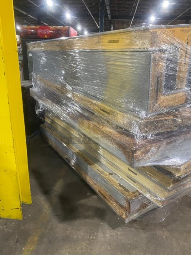 Commercial 7'x7' walk-in cooler box packed on a pallet. Includes 2-fan evaporator blower and Tecumseh condensing unit.