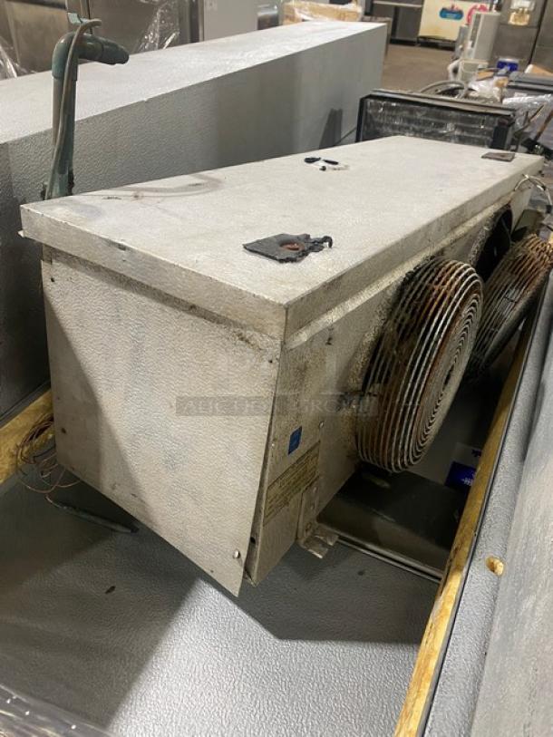 Commercial 7'x7' walk-in cooler box with 2-fan evaporator blower, Tecumseh condensing unit. Good condition.