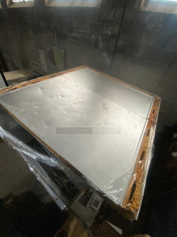 Commercial heavy-duty 5'x9' walk-in cooler box with Copeland condensing unit. Metal panels; appears in used condition.