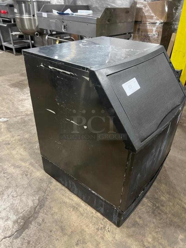 Manitowoc NEO Series stainless steel ice machine and bin combo, model UYF0140A161B. Air-cooled, 115V, 1 phase. Slight wear visible.
