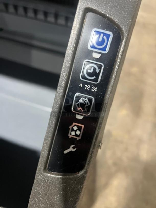 Control panel of Manitowoc NEO Series Ice Maker Model UYF0140A161B showing power, cycle, clean, and maintenance icons.