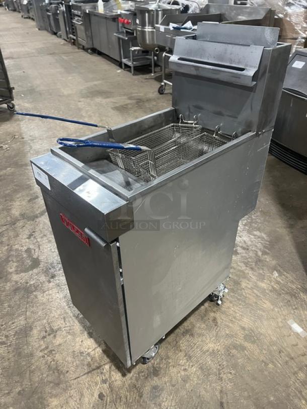 Vulcan LG400 stainless steel 50 lb. deep fat fryer with backsplash, basket hanger, and fry basket; on casters; Model SN: DV-1070061HB.