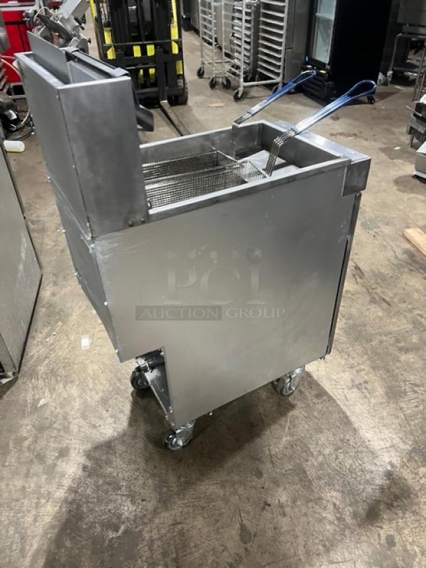 Vulcan LG400 commercial stainless steel deep fat fryer, natural gas, 50 lb capacity, with backsplash, basket hanger, fry basket, on casters.