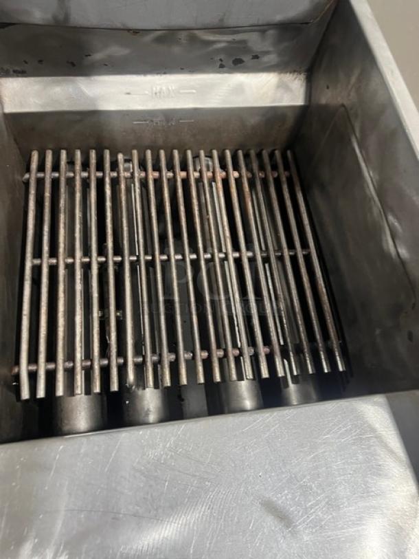 Vulcan LG400 deep fat fryer, stainless steel, natural gas, 50 lb capacity, with backsplash and basket hanger, on casters.