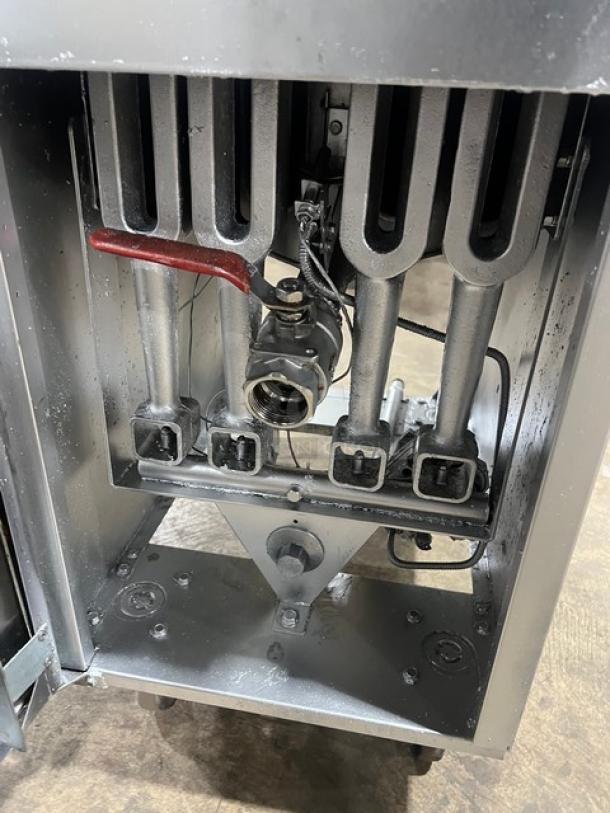 Vulcan LG400 deep fryer interior view, showing heating elements. Stainless steel, natural gas-powered, on casters.