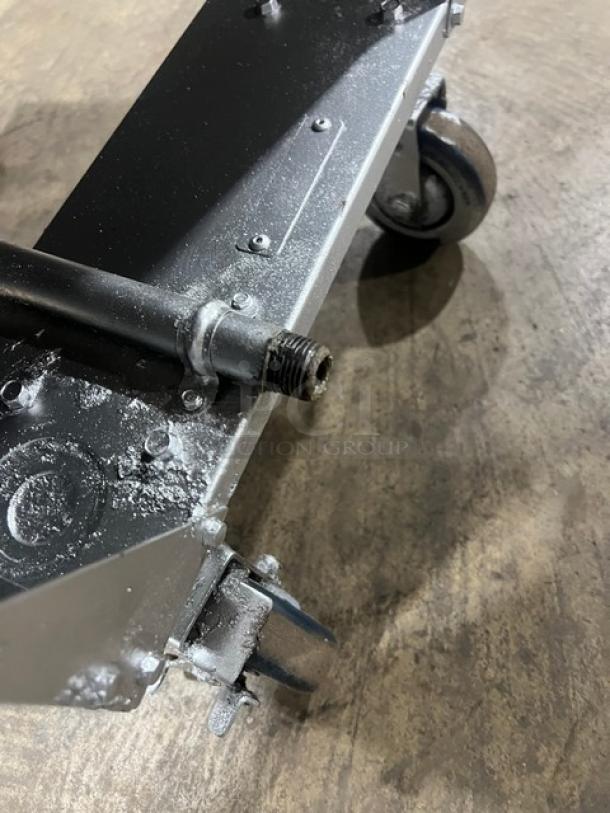 Vulcan LG400 fryer base on casters, showing connection point. Model: LG400, SN: DV-1070061HB. Condition details visible.