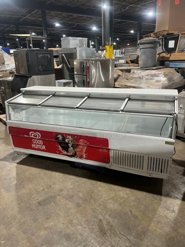 Hussmann LBN8 ice cream display freezer, Good Humor branding, 96" wide, 4 glass sliding doors, 115V, used condition.