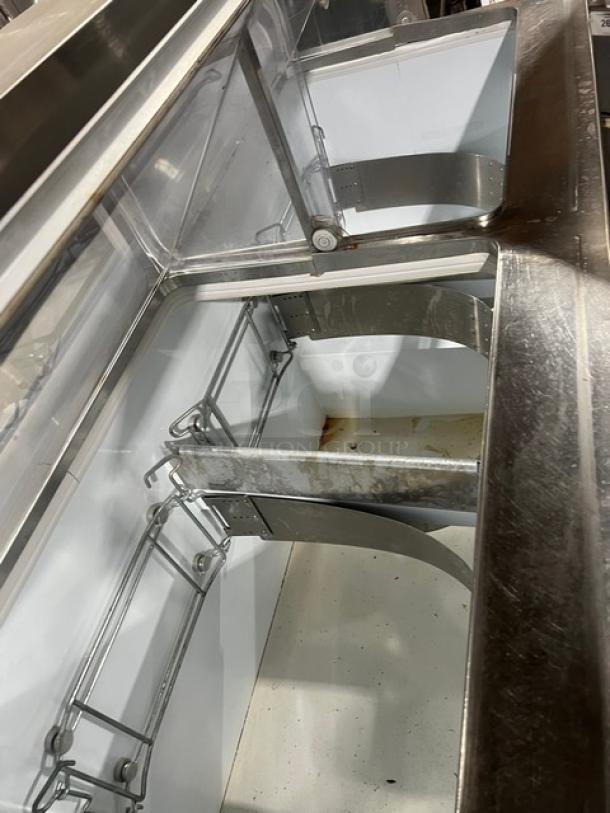 Beverage-Air BRT68P 68" white ice cream dipping cabinet with sneeze guard and rear lift doors, model shown in good condition.