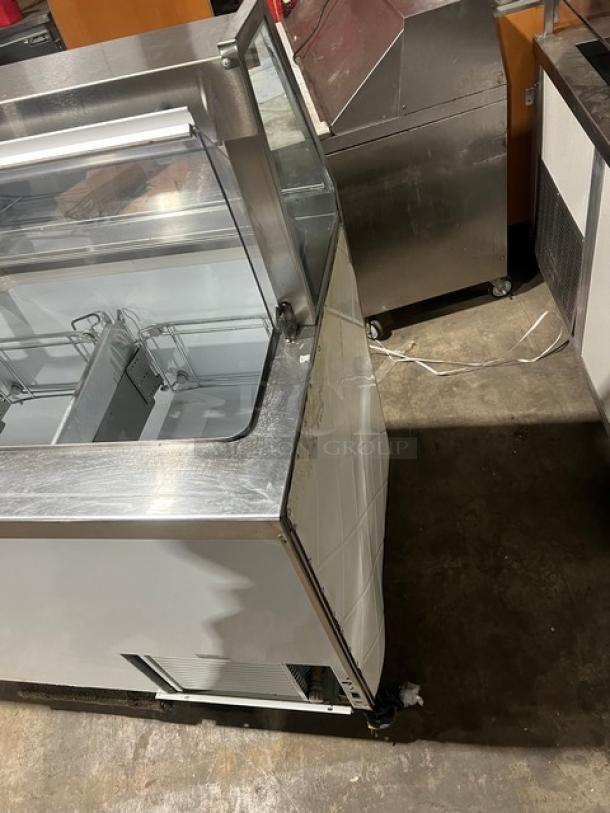 Beverage-Air BRT-68P 68" white horizontal ice cream cabinet with sneeze guard, double lift-open doors; commercial use.