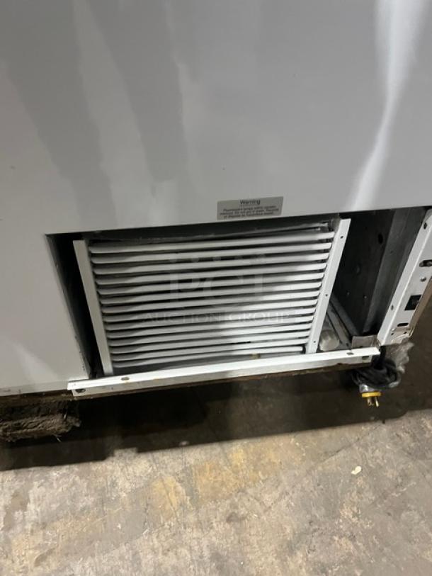 Beverage-Air BRT-68P commercial 68" white ice cream cabinet, rear lift doors, sneeze guard, 115V, good condition.