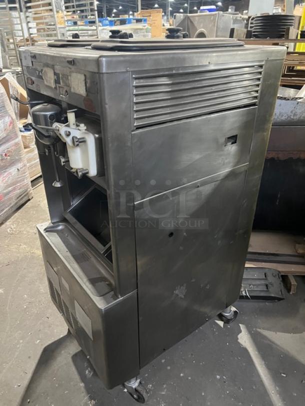 Taylor Model 63233 stainless steel dual shake and soft serve freezer with spinner head mixer, on casters, 208/230V 3 Phase.
