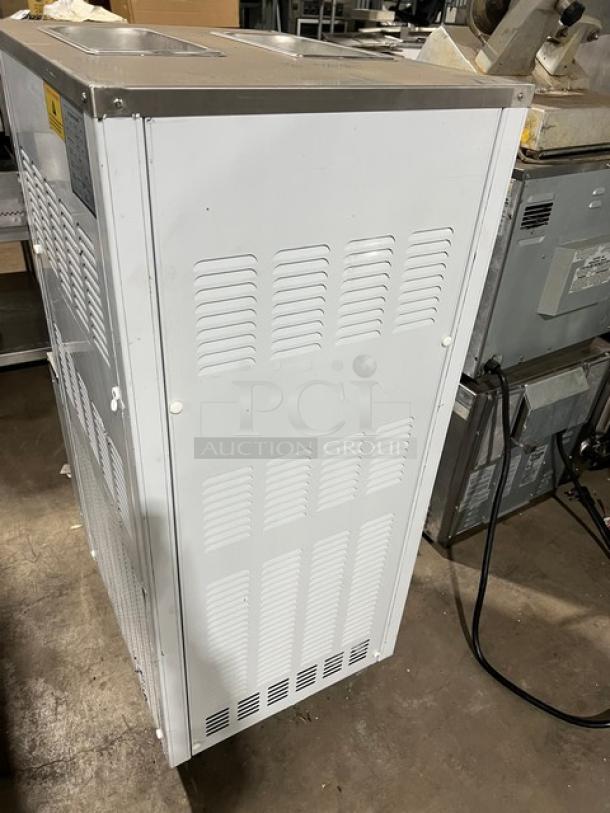 2024 stainless steel electric soft serve machine, Model XY-25L, on casters, excellent condition, 110V, commercial use.