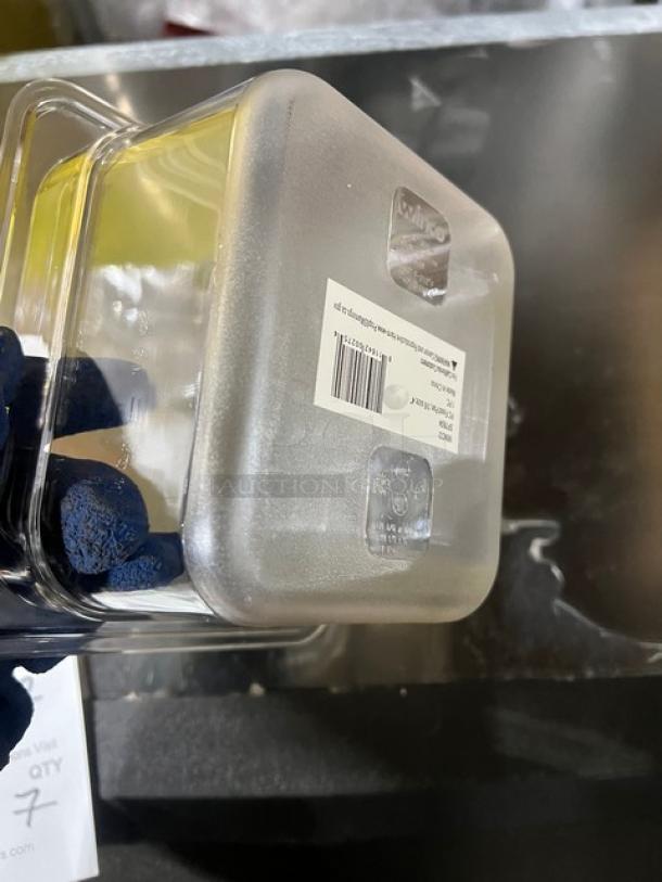 Winco SP7604 food pan, 1/6-size, 4" deep, clear polycarbonate, new condition, barcode label visible.