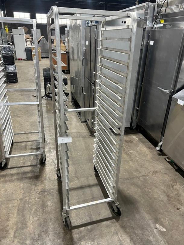 Commercial aluminum full-height bun/sheet pan rack on casters, excellent condition, 20 slots. Ideal for bakery use.